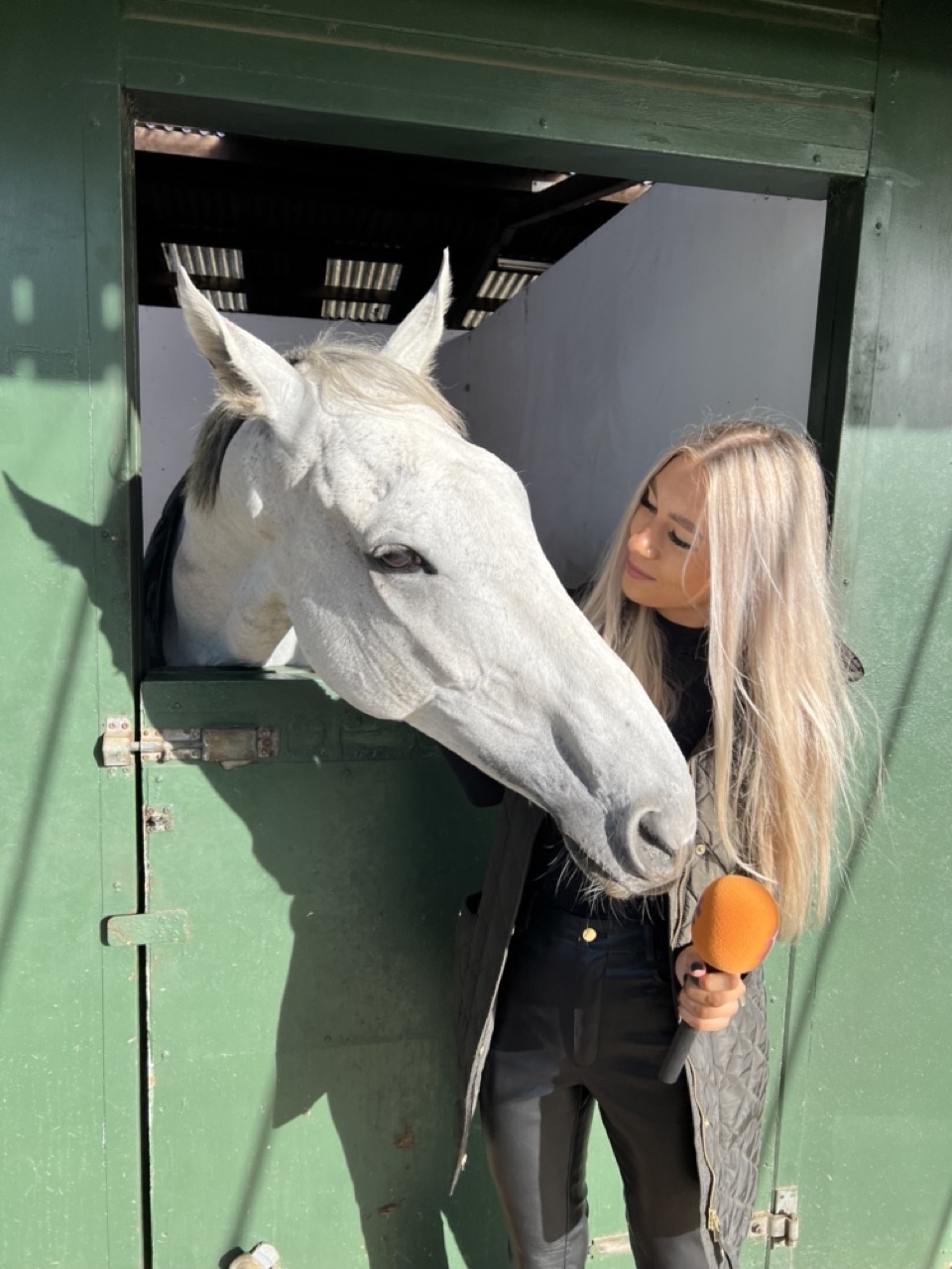 Bristol De Mai having a nibble of the Raceday mic